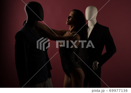 A young girl with problematic skin suffers from loneliness in a society of stylish manikins. 69977136