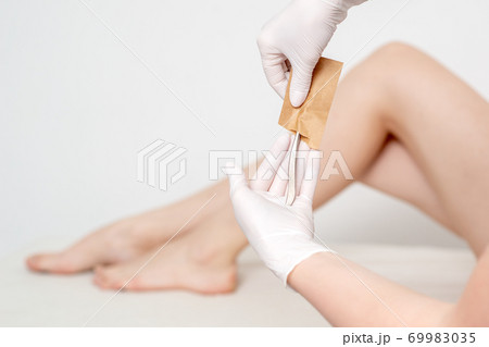 Human hands holding craft envelope Human hands holding craft envelope 69983035