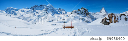 Panoramic beautiful view bench in snow mountain Matterhorn peak, Zermatt, Switzerland. 69988400