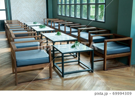 table and chairs, Modern restaurant interior 69994309