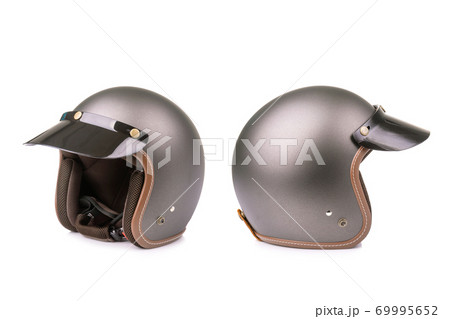 New grey vintage helmet. Studio shot isolated on white New grey vintage helmet. Studio shot isolated on white 69995652