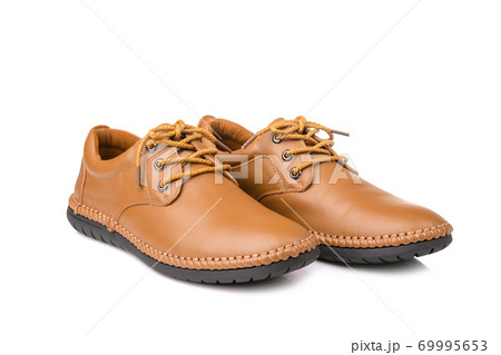 New brown men leather shoes. Studio shot isolated on white 69995653