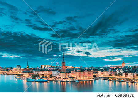 Stockholm, Sweden. Scenic View Of Stockholm Skyline At Summer Evening. Famous Popular Destination Scenic Place In Dusk Lights. Riddarholm Church In Night Lighting 69999379