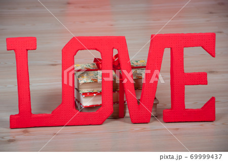 Big white letters. Lettering Love. Close up. Big white letters. Lettering Love. Close up. 69999437