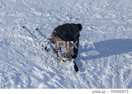 Man skiing in the snow in winter Man skiing in the snow in winter 70000975