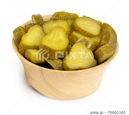 Marinated pickled cucumber in wooden bowl isolated on white background with clipping path and full depth of field Marinated pickled cucumber in wooden bowl isolated on white background with clipping path and full depth of field 70002165