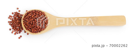red quinoa seeds in wooden spoon isolated on white background with clipping path and full depth of field. Top view. Flat lay 70002262