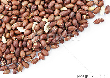 Peanuts on a white background. Top view. Peanuts on a white background. Top view. 70003239