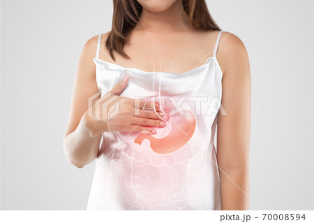 A woman suffering from gastroesophageal reflux disease A woman suffering from gastroesophageal reflux disease 70008594
