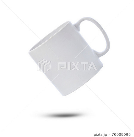 White ceramic cup on white background. White ceramic cup on white background. 70009096