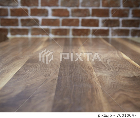 Wood table and wall background in kitchen Wood table and wall background in kitchen 70010047