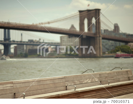 Brooklyn Bridge on the background of the city, New York 70010371