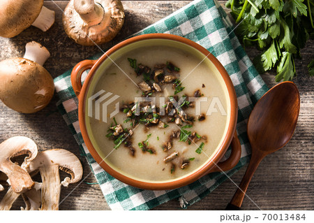 Homemade mushroom soup in bowl on wooden...の写真素材 [70013484
