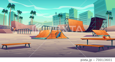 Skate park with ramps in tropical city 70013601