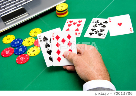 Man playing poker Man playing poker 70013706