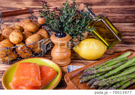 Set of fresh products for healthy food on wooden table 70013977