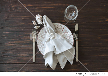 Elegantly holiday dinner table in sea style. Festive table setting. Concept Wedding, Birthday or Mother's Day. Elegantly holiday dinner table in sea style. Festive table setting. Concept Wedding, Birthday or Mother's Day. 70014833