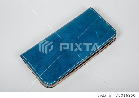 blue leather case notebook isolated on white background. 70016850