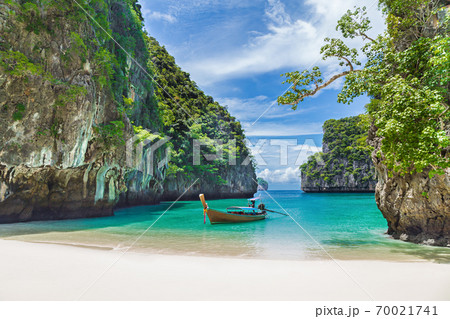 Thai traditional wooden longtail boat and beautiful beach in Thailand. 70021741