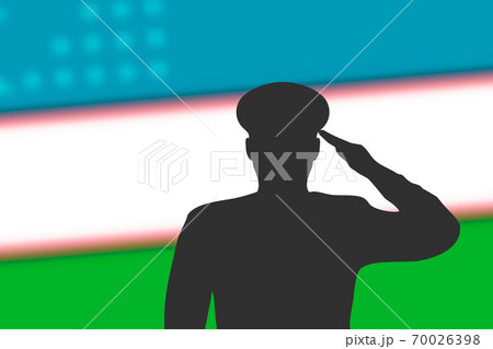 Solder silhouette on blur background with Uzbekistan flag. 70026398