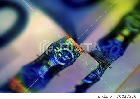 Close up of Euro symbol on bill 70027526