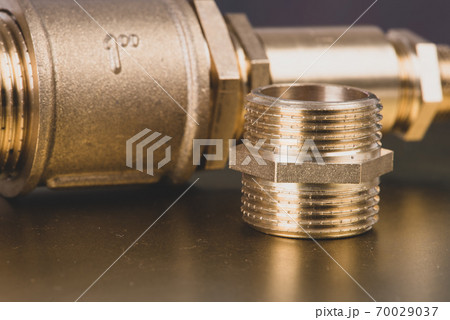 Close-up Brass Fittings Connectors For Water And Gas Installation Close-up Brass Fittings Connectors For Water And Gas Installation 70029037