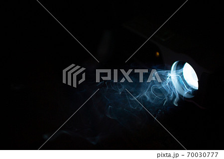 Film projector light ray with smoke in darkness Film projector light ray with smoke in darkness 70030777