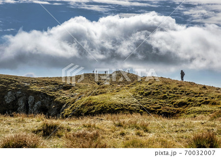 Tourists in Salatin peak, Western Tatras, Slovakia, hiking theme Tourists in Salatin peak, Western Tatras, Slovakia, hiking theme 70032007