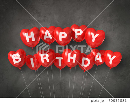 Red happy birthday heart shape air balloons on a concrete background Red happy birthday heart shape air balloons on a concrete background 70035881
