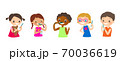 Multiracial kids brushing their Teeth. 70036619