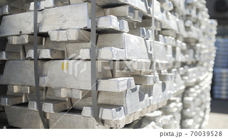Aluminum ingots in Stock Warehouse. Billets for aluminium profile production at a metallurgical plant 70039528