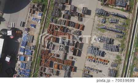 Aerial view Oil and Gas Wellhead tree equipment production plant. The working process in a warehouse with a metal. Equipment for wellhead conncetion of oil and gas wells. 70039699