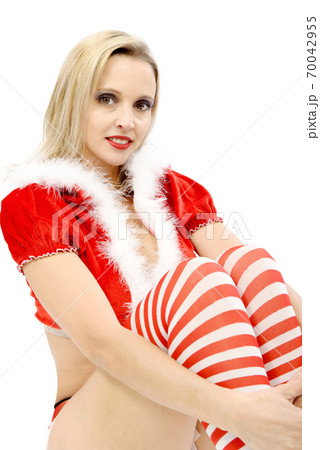 Portrait of beautiful girl wearing santa claus Portrait of beautiful girl wearing santa claus 70042955