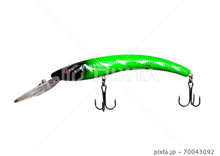 Green modern fishing tackle for spinning on white background, isolate, close-up 70043092