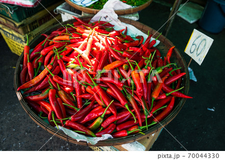 Chili and spices in bags are sale in the market. Chili and spices in bags are sale in the market. 70044330