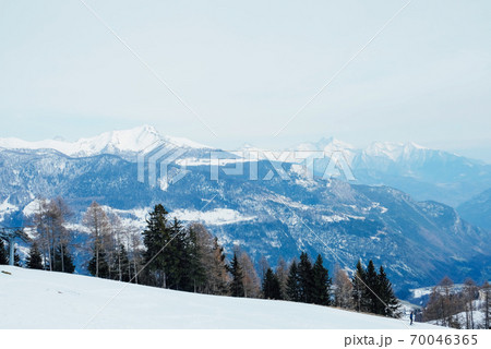 Winter landscape with mountain slopes covered with snow. 70046365