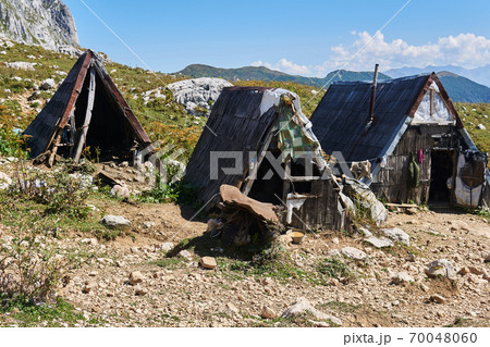 saddler's temporary workshop in the mountains while grazing livestock in highlang pastures in the Caucasus, Russia 70048060