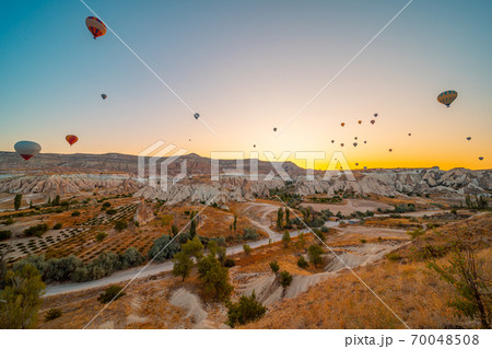 balloons in sunrise light in Cappadocia Turkey Goreme balloons in sunrise light in Cappadocia Turkey Goreme 70048508