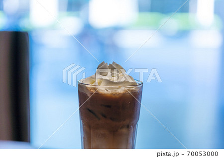 Iced coffee with whipped cream and sprinkle with almonds 70053000