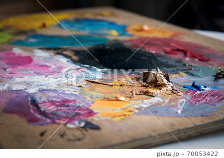 Artist's color palette. Dried oil paint. Creativity and art Artist's color palette. Dried oil paint. Creativity and art 70053422