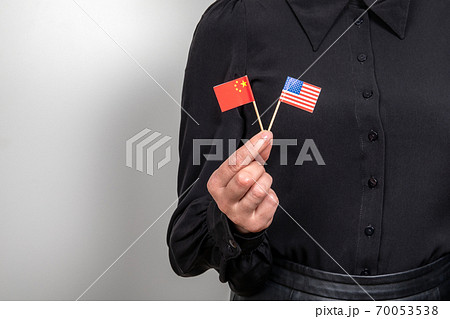 United States and chinese flag. Economic and political relations. Import export and trade war United States and chinese flag. Economic and political relations. Import export and trade war 70053538