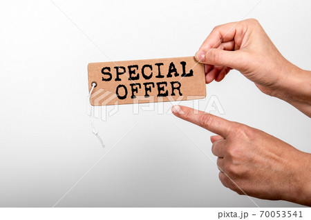 SPECIAL OFFER. Online sales, bargain and delivery terms concept. Cardboard price tag with string SPECIAL OFFER. Online sales, bargain and delivery terms concept. Cardboard price tag with string 70053541