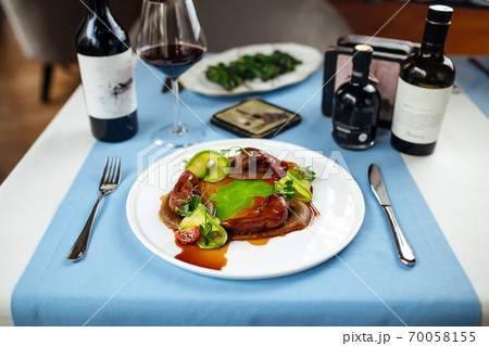 Lamb tongues with caramelized onion puree Lamb tongues with caramelized onion puree 70058155