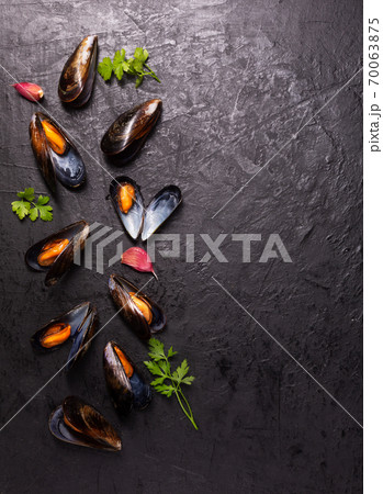Boiled mussels on dark background with copy space 70063875