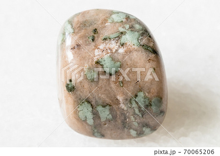 polished Nunderite (Nundorite) on white marble polished Nunderite (Nundorite) on white marble 70065206