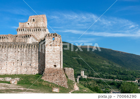 View of castle (Rocca Maggiore), medieval fortress dominating the city Assisi View of castle (Rocca Maggiore), medieval fortress dominating the city Assisi 70066290