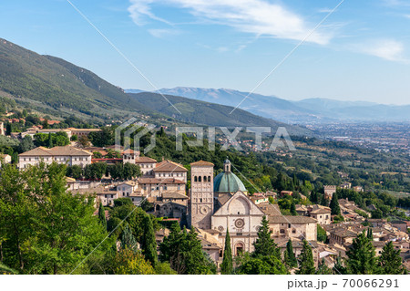 Panoramic view of the historic town of Assisi and hills of Umbria, Umbria, Italy Panoramic view of the historic town of Assisi and hills of Umbria, Umbria, Italy 70066291