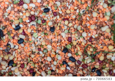 Different types of legumes. Chickpeas, red lentils, yellow peas and beans. Top view Different types of legumes. Chickpeas, red lentils, yellow peas and beans. Top view 70066583