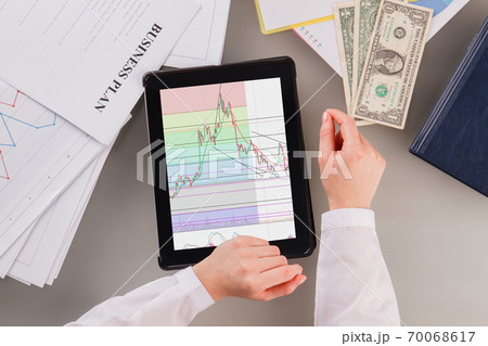 Trader woman working on project. Trader woman working on project. 70068617