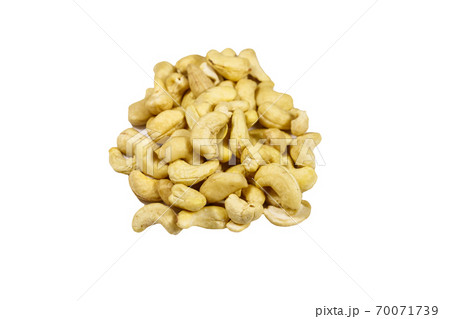 Pile of cashew nuts isolated on white background Pile of cashew nuts isolated on white background 70071739